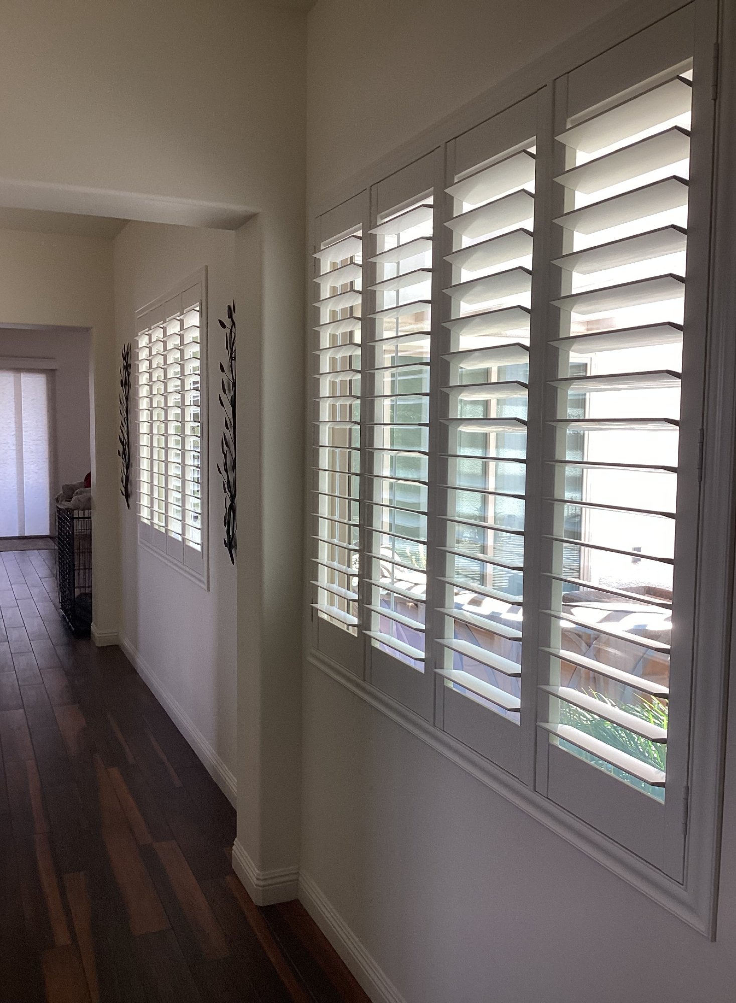 White plantation shutters installed in a Las Vegas home hallway